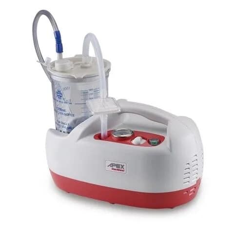 A portable suction machine with a red and white body, clear collection canister, tubing, and power switch.