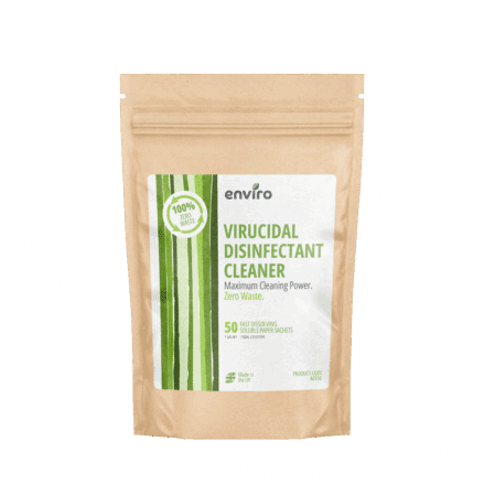 A brown resealable pouch labeled "Enviro Virucidal Disinfectant Cleaner" with 50 fast-dissolving sachets, designed for healthcare supplies, promoting zero waste and maximum cleaning power.